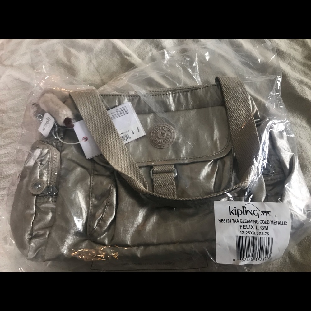 Brand new with tags Kipling purse.